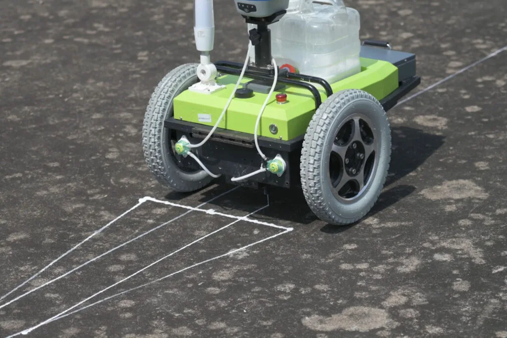 TOKNAV Intelligent marking robot solution for robotic field marking, GNSS-guided line painting and venue operations