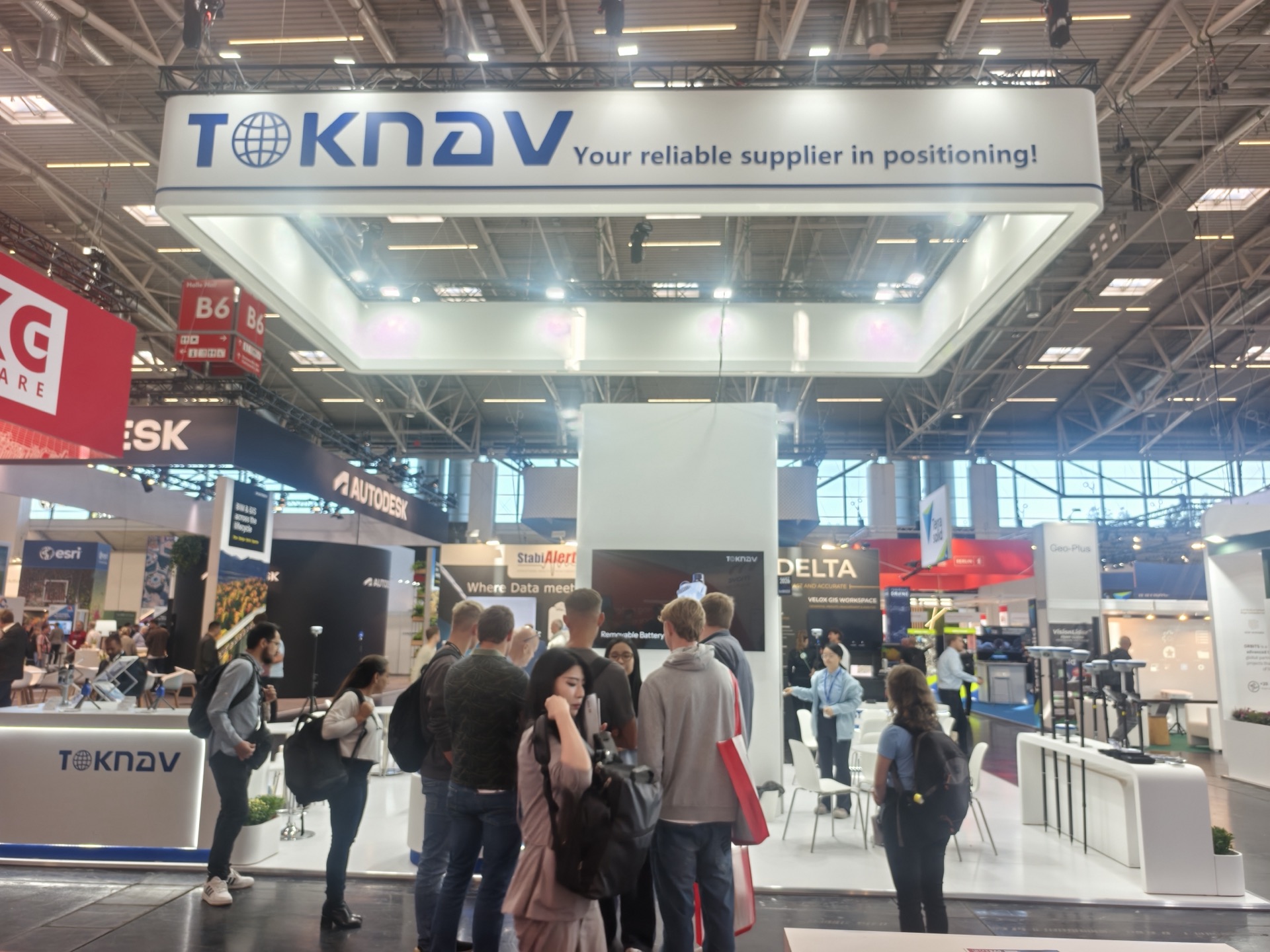 International visitors at the TOKNAV booth during Intergeo 2026
